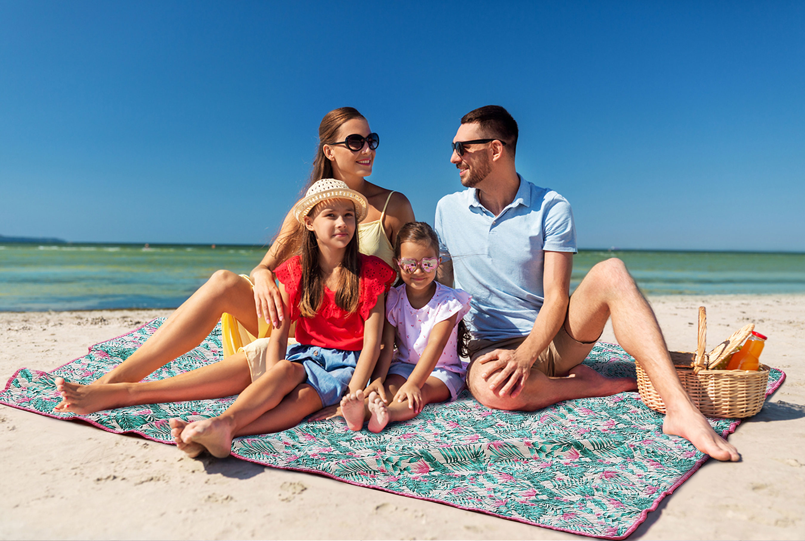 Printed beach quilt with portable handle single piece